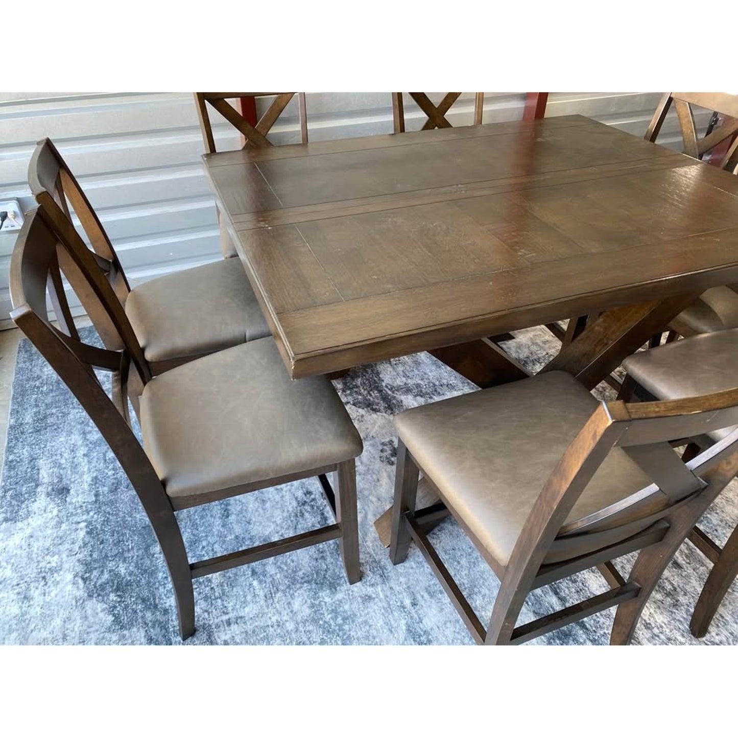 Collins 9 Piece expandable Counter Height Dining Set large square table eight upholstered chairs.